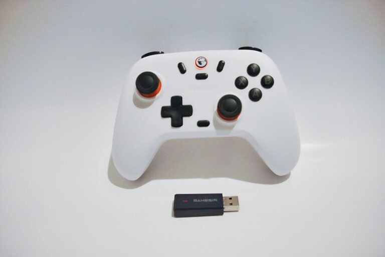 GameSir Nova Lite wireless Bluetooth gaming controller with USB dongle shown in front view. Reviewed by Gaming Extra Reviews.