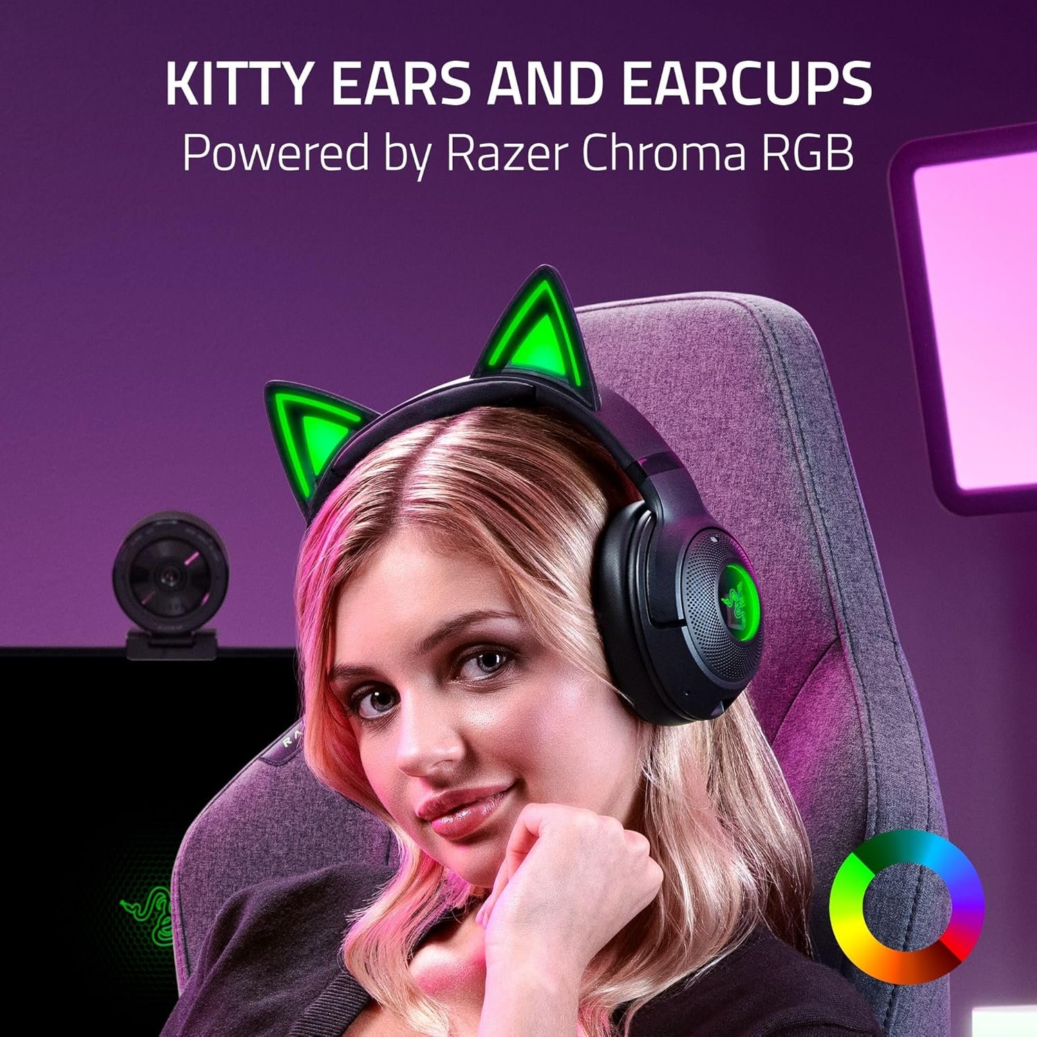 Woman wearing neon-green cat-ear headphones in a gaming setup with an RGB color wheel in view.